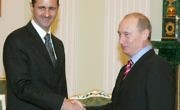 الرئيس الروسي فلاديمير بوتين يستقبل الأسد (AFP)