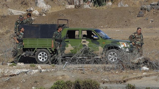 جنود الجيش السوري يعودون إلى هضبة الجولان (AFP)